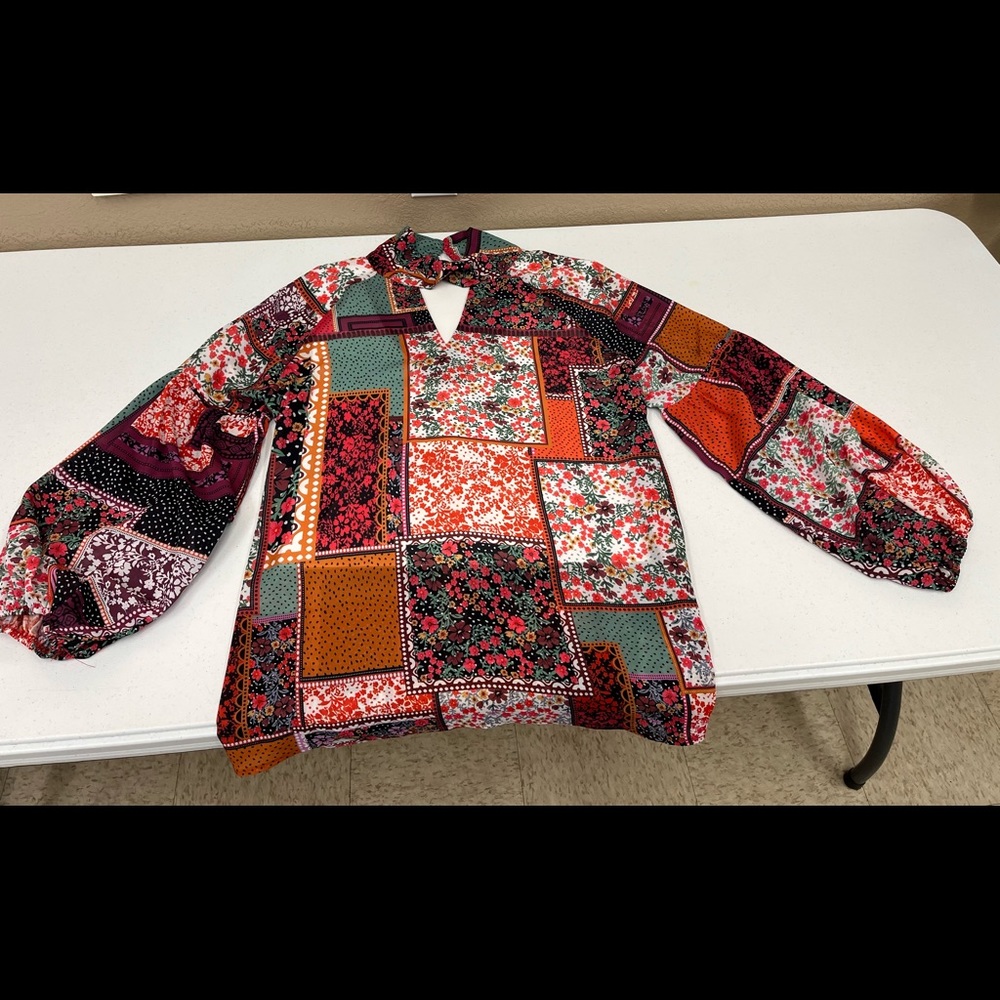 Boho Print Blouse, 95% Polyester 5% Spandex with long trumpet hem
